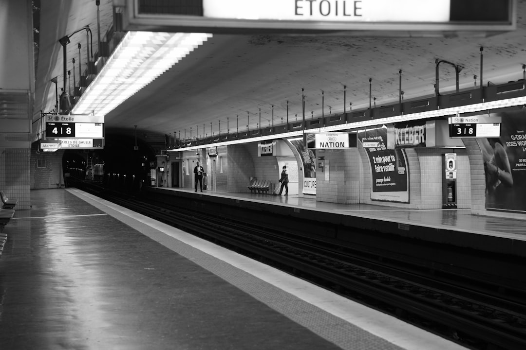 An empty subway station platform at night