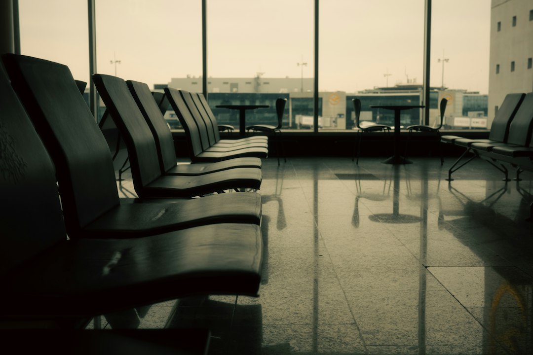 Empty waiting area with rows of chairs
